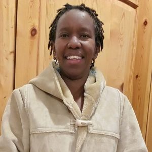 Knee length faux-fur coat